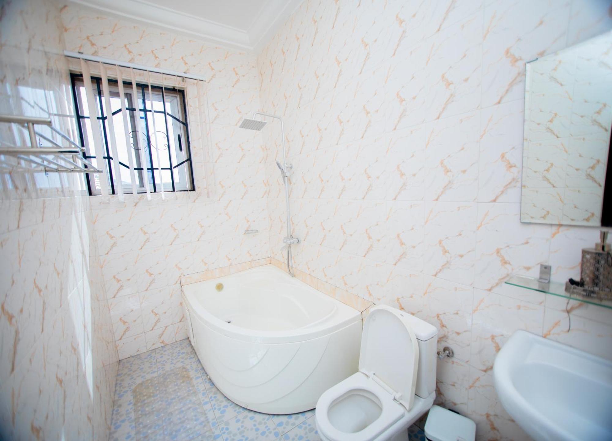 Aduk Guest House Airport City Аккра Экстерьер фото